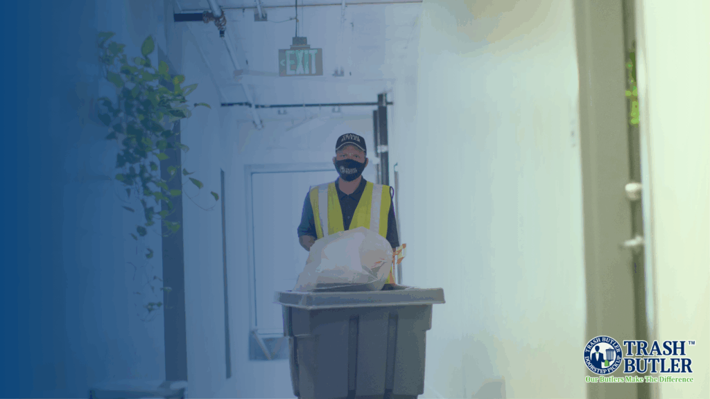 A Team Member Pusing A Valet Trash Cart, A Service On The Apartment Amenities List